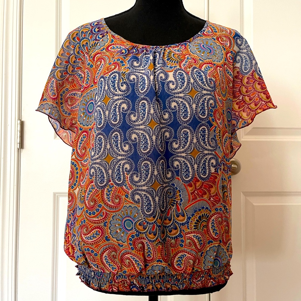 100% Polyester top. Size PM